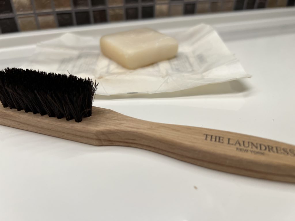 The Laundress brush — How to do Laundry on a Cruise