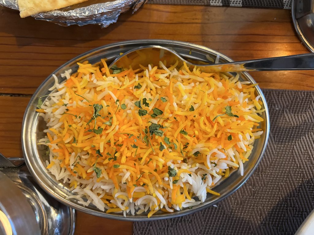 Colorful pilau rice dish with herbs