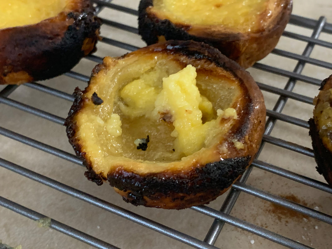 Mini Pastel de Nata made with undercooked Frozen Puff Pastry | Traveling Through Food 