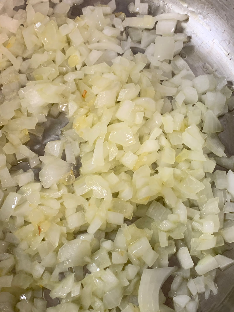 Sautéonions and garlic - Sopa de Frijoles Recipe - Traveling Through Food Blog