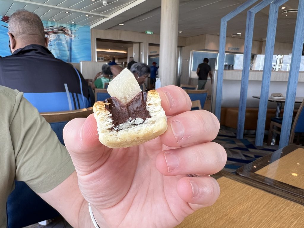 A delicious bite sized chocolate filled pastry at the Windjammer Buffet on Royal Caribbean
