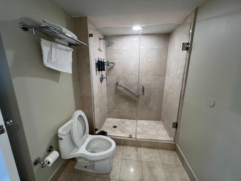 Toilet and Shower Bathroom at Fort Lauderdale Cruise Hotel Review — GalleryOne DoubleTree Suites by Hilton
