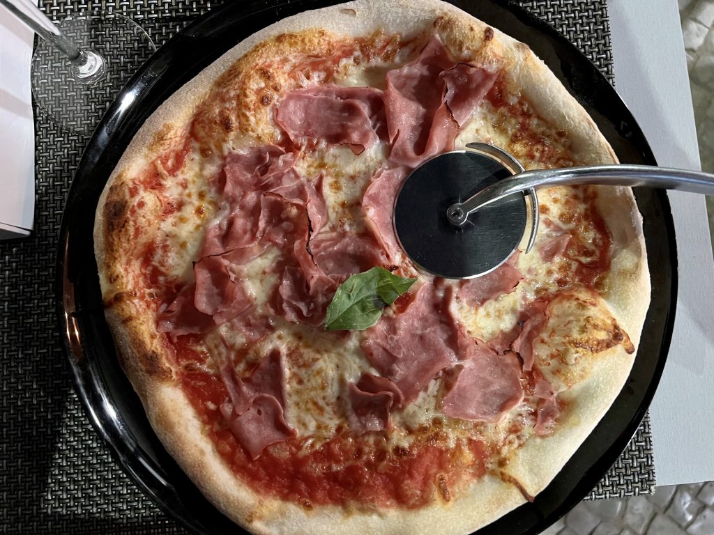 Prosciutto Pizza at Gusto'zza Pizzeria in Quarteira, Portugal