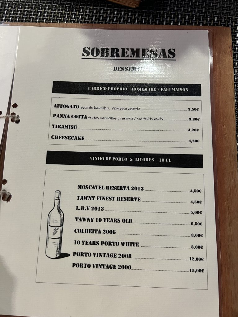 Menu with prices at Gusto'zza Pizzeria in Quarteira, Portugal