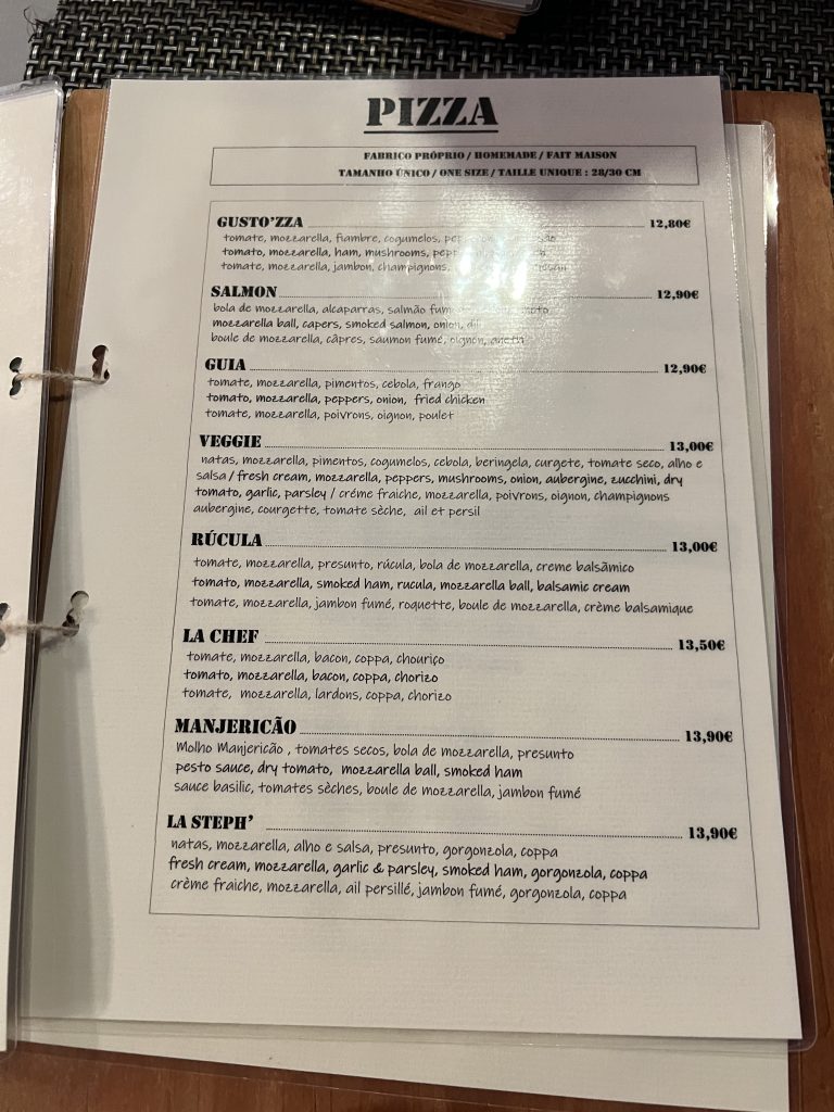 Menu with prices at Gusto'zza Pizzeria in Quarteira, Portugal