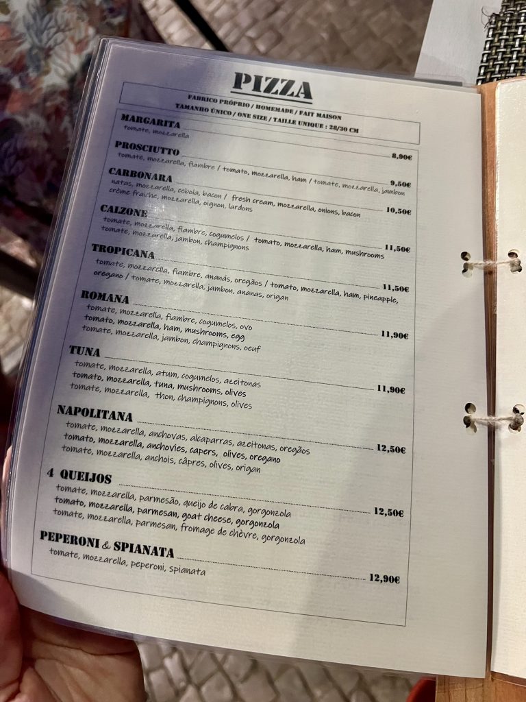 Menu with prices at Gusto'zza Pizzeria in Quarteira, Portugal