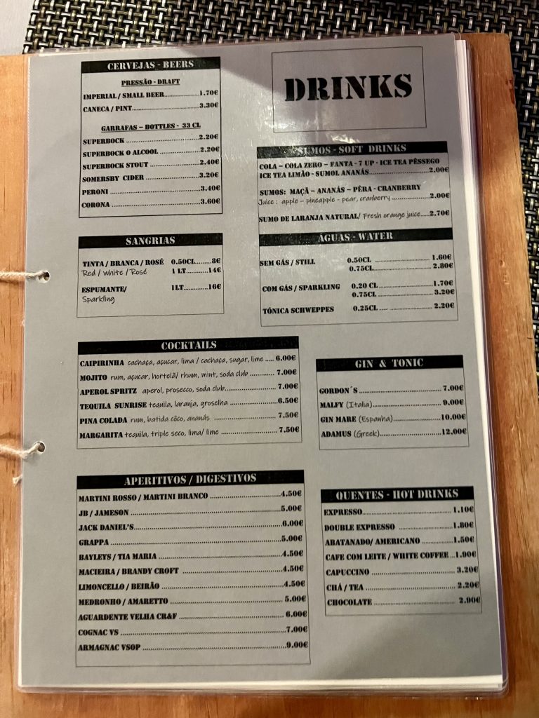 Menu with prices at Gusto'zza Pizzeria in Quarteira, Portugal