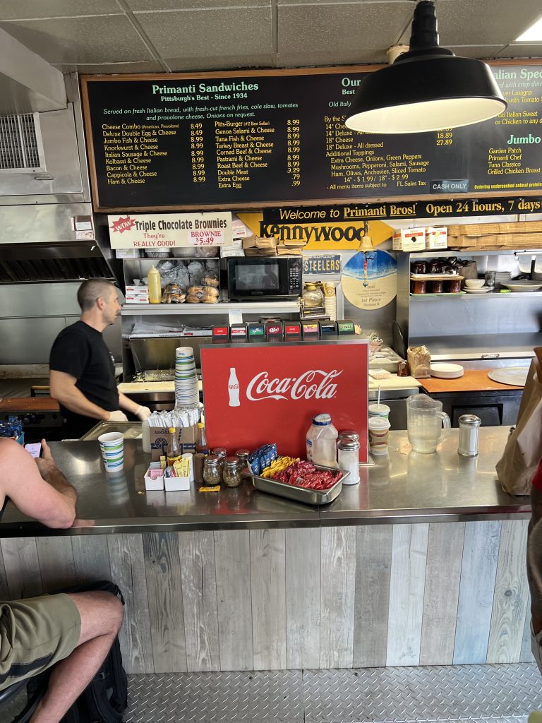 Pittsburgh memorbilia like a Kennywood and Steelers Sign at Primanti Brothers Fort Lauderdale Florida