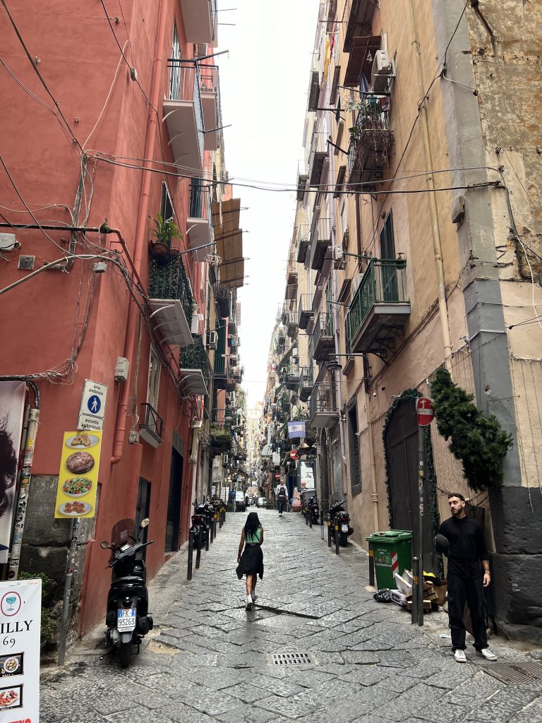 Girl Walks Down Naples Street — One Day in Naples Cruise Port 