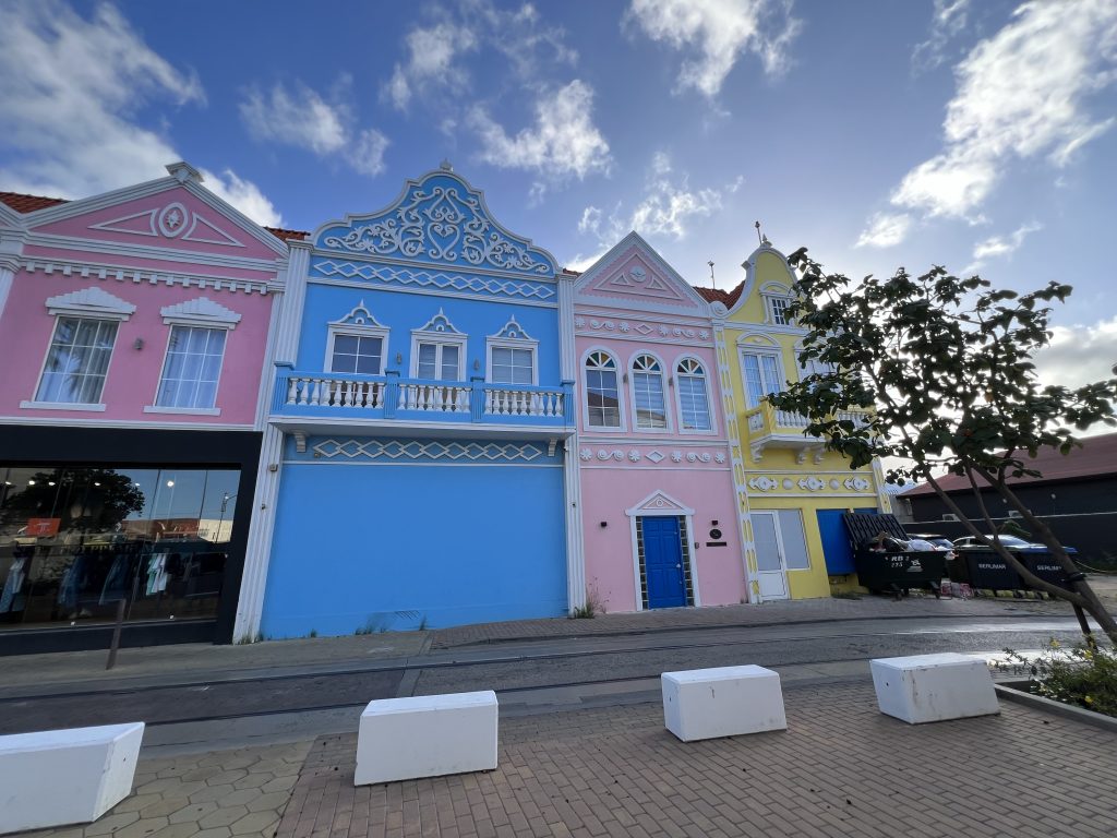 More cute pastel colored buildings — One Day in Aruba Cruise Port on Symphony of the Seas