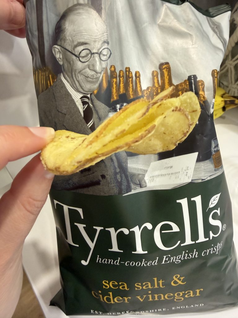 Tyrrell's Sea Salt and Cider Vinegar Hand Cooked English Crisps Review | Packaging and crunchy kettle chip close up