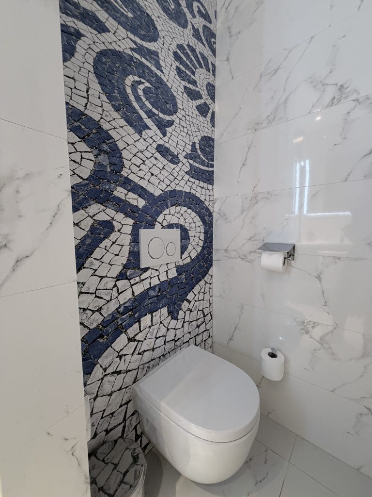 Toilet with Calçada backsplash — Eurostars Universal Lisboa — Lisbon Hotel Review