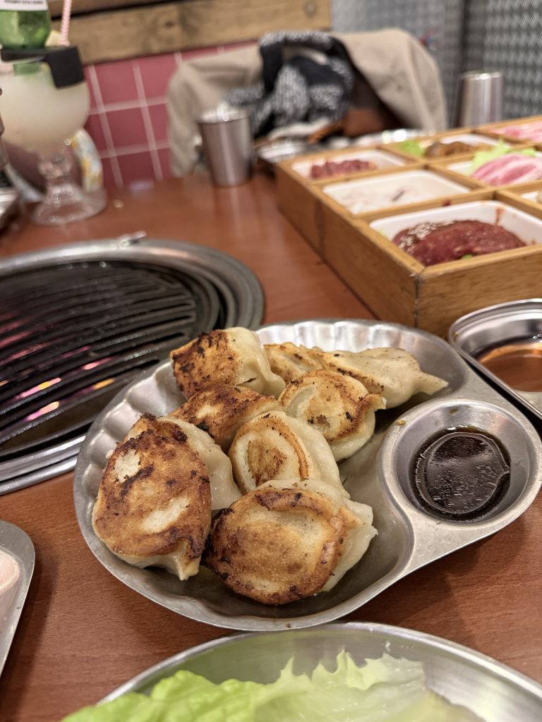 Gyoza Frita (fried Japanese dumplings) on a plate with soy sauce at Han Table Barbecue Lisbon Expo
