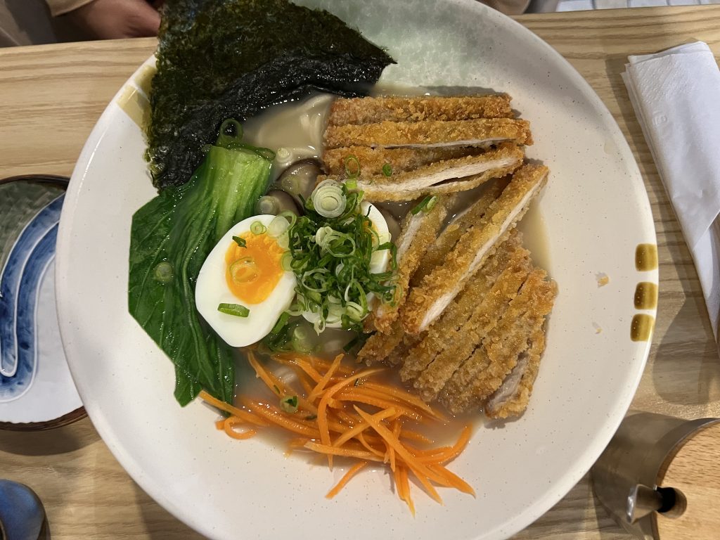 Top view of Chicken Ramen — fried chicken slices, wok choi, nori, shreeded carrot, spring onions, home made noodles, and soft boiled eggs – Yuki Ramen Lisbon Photo Review