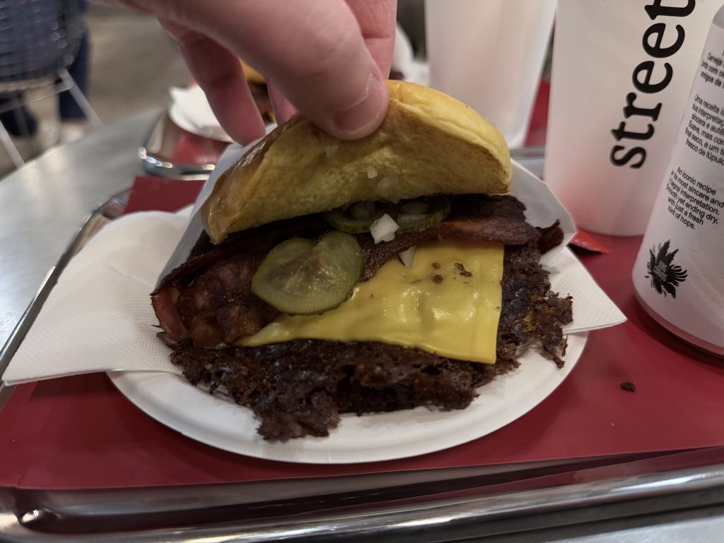 Street Smash Burger Lisbon Review Alvalade Photos | Lifted top bun to show pickle, bacon, cheese slice and smash burger patty | Best Smash Burger in Lisbon?