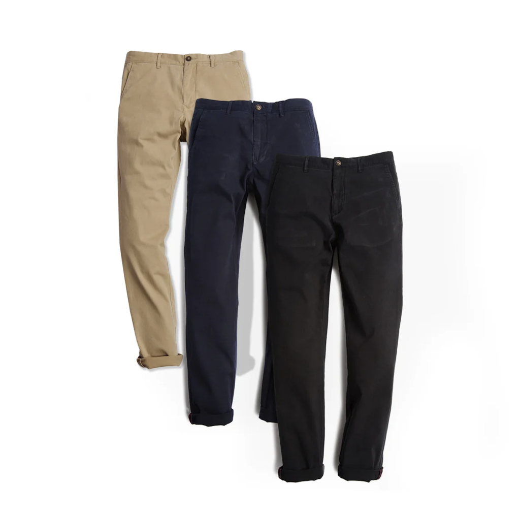Three pairs of Mott and bow men's chinos in khaki, navy, and black