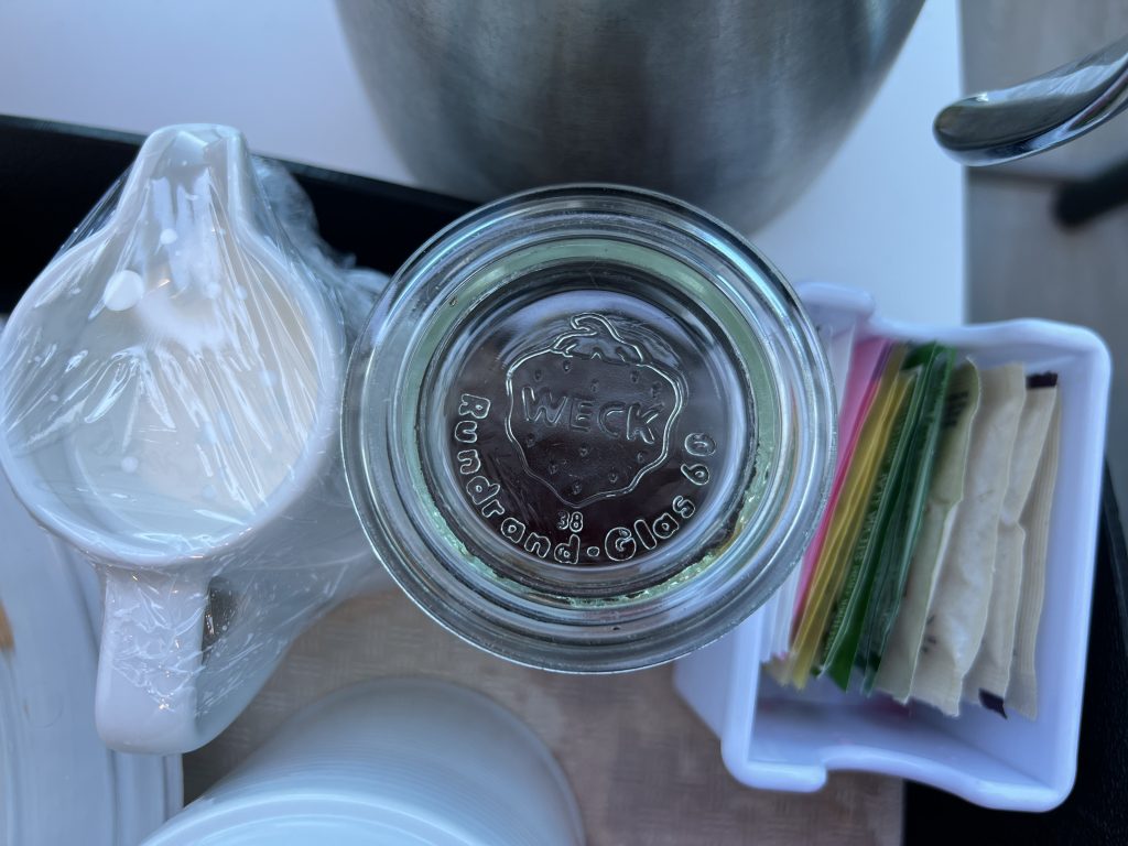 Close up of glass jam jar continental breakfast| Celebrity Ascent Review Western Caribbean Itinerary