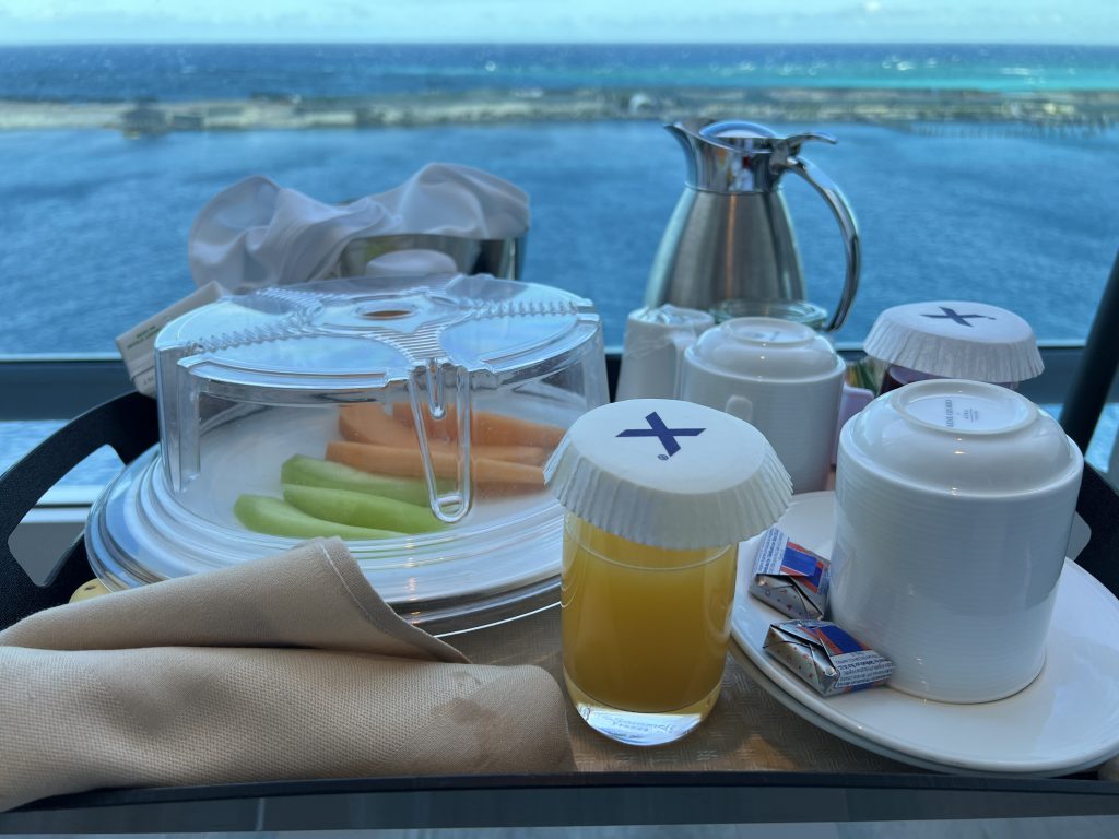 View of free continental breakfast on infinite balcony 8280 in Nassau, Bahamas | Celebrity Ascent Review Western Caribbean Itinerary