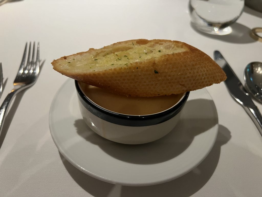 Creamy Tuscan Shrimp Soup with Garlic Bread On Top  | Celebrity Ascent Cruise Food Reviews and Pictures