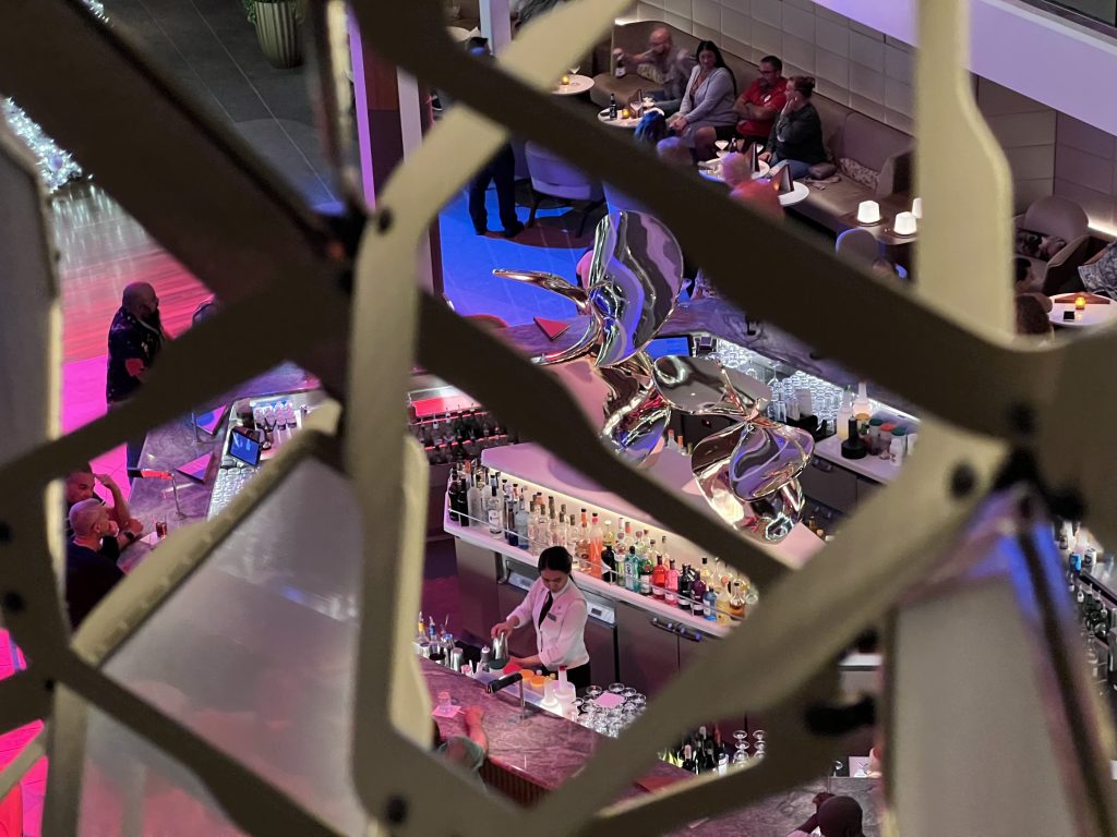View of Martini Bar through Art Installation | Celebrity Ascent Review