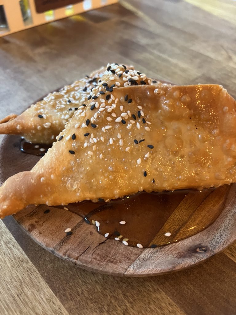 Meraki Greek Bistro Review Photos — Honey and Sesame Cheese Puffs Close Up | Miami Happy Hour Restaurant Reviews