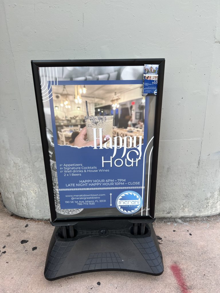 Meraki Greek Bistro Review Photos — Happy Hour Menu Sidewalk Sign | Miami Restaurant Reviews