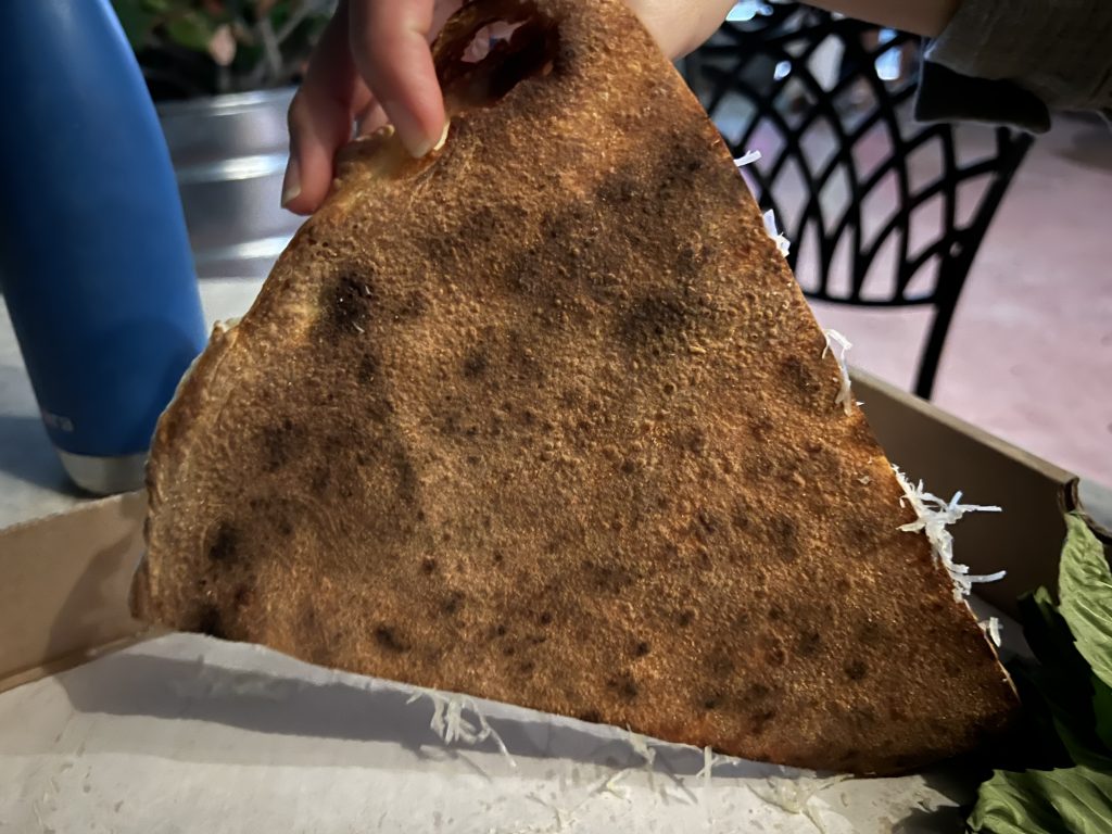 Miami Slice Review Photos — Bottom Crust of Margherita Pizza Slice with Inside Pizza Box | Miami Restaurant Review