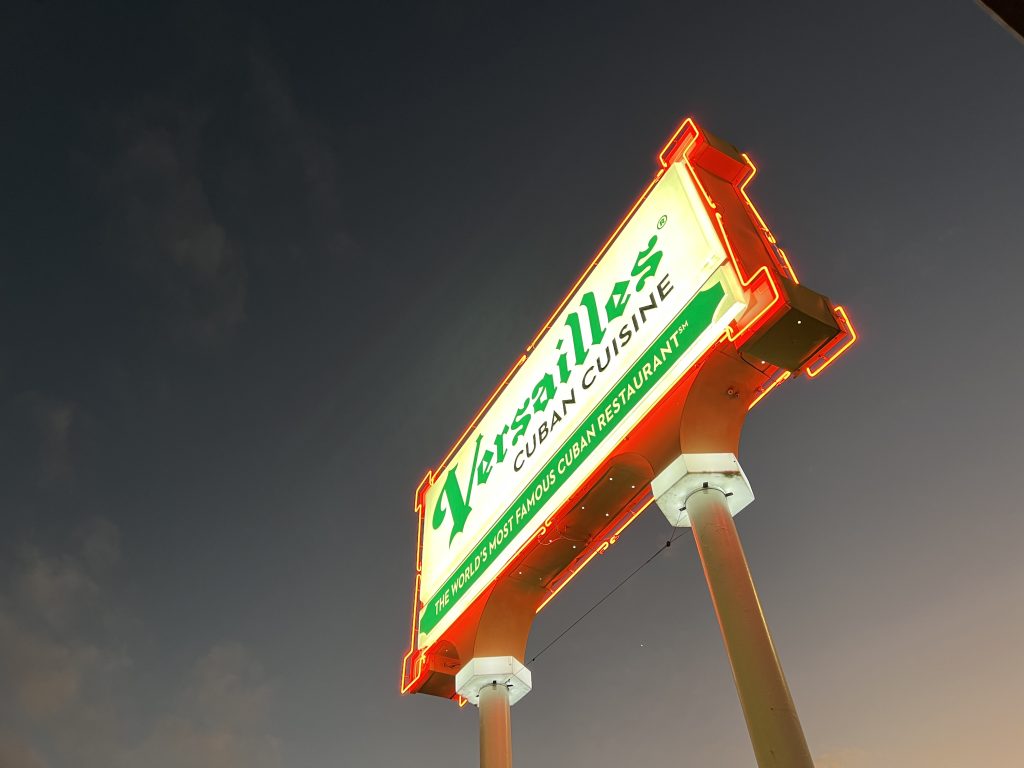 Neon sign outside Miami's iconic Versailles Cuban Cuisine  in Little Havana | Miami Restaurant Reviews